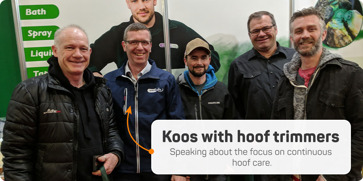 Koos Vis with group of hoof trimmers speaking about the focus on continous hoof care.